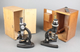 A Britex Minor 2209 single pillar student's microscope, boxed and an SHC 100x, 200x, 300x student's single pillar microscope boxed 