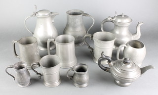 A pewter lidded jug 8", a Victorian pewter pint tankard inscribed Bargepole Court Marlow, the base engraved, a Victorian half pint pewter tankard marked G Farmiloe & Sons London   inscribed Cross Keys at Hartford, 5 other pewter tankards, 2 pewter teapots and a pewter jug 