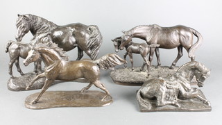 After Herbert Glen, a bronzed figure of a running stallion on an oval base 7", after Tom Machie a bronzed figure group of a standing mare and foal on an oval naturalistic base 7", after A Oxenbould a bronzed figure group of a mare and foal 9" (foal is loose to the base) and 1 other bronzed figure of a seated Arab horse on a rectangular base marked MJS 4 1/2" 