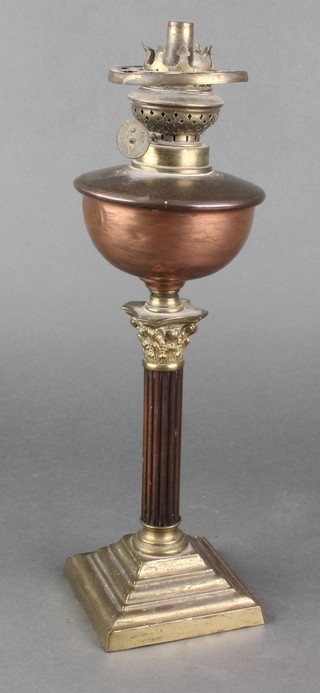 A copper oil lamp reservoir raised on a Corinthian column with stepped base 13" 