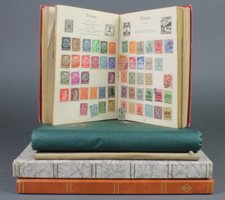 An album of various used world stamps, a green album of used GB and world stamps, a brown postage stamp album, various world stamps and 2 stock books of world stamps