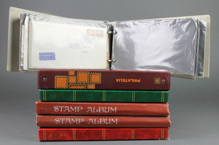 An album of GB first day covers and presentation stamps, an album of world stamps, 3 stock books of used world stamps 