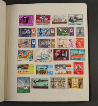 An album of used world stamps - Portuguese Colonial, Portuguese Indian, Thomas & Prince Islands, Timor, Puerto Rico, Qatar, Rwanda etc