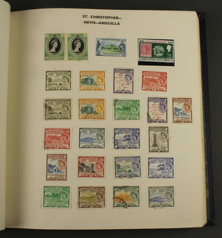 An album of stamps including St Helena, St Kitts Nevis, St Lucia, St Vincent 