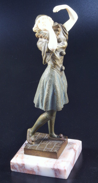 Gerard, an Art Deco bronze and ivory figure of a standing Pierot, raised on a pink veined marble base, the base signed Gerard 7"h 