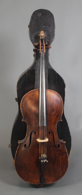 A cello with 2 piece back, bearing label Couleurs Des Abauts de Soie Aux Cordes D'acier Chrome, 27 1/4", together with an unsigned bow and contained in an ebonised wooden carrying case 