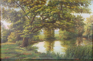 J. Obrlel, oil on canvas, a river landscape with trees, indistinctly signed, 22 1/2" x 34" 