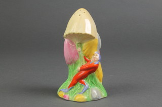 A Royal Winton Art Deco sugar shaker in the form of an elf beneath a toadstool 5 1/2" 