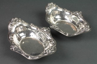 A pair of Continental repousse silver bon bon dishes, 206 grams