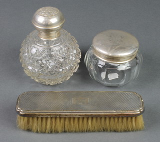 A silver mounted bulbous scent with Reynolds Angels lid, a silver mounted jar and a brush 