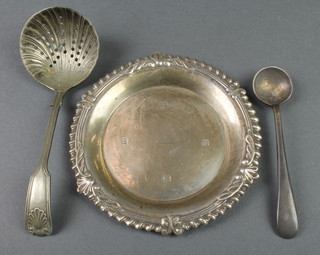 A silver nut dish with fluted and scroll rim, Birmingham 1968, 40 grams, 2 plated spoons 
