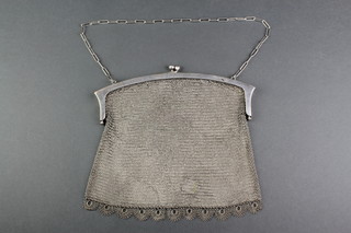 A silver plated mesh purse