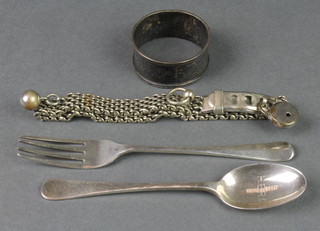 A silver napkin ring, spoon and fork, a plated bracelet 