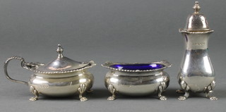 A 3 piece silver condiment with gadroon rim on paw feet, Sheffield 1936 and 1938, 196 grams