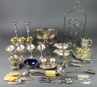 A silver plated swing handled basket, a large quantity of silver plated items