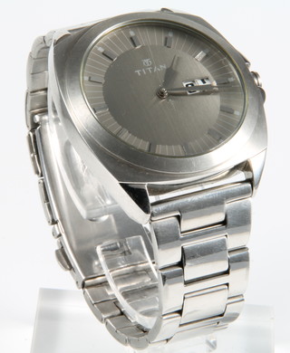 A gentleman's Titan steel cased calendar wristwatch on a steel bracelet