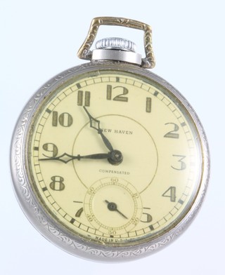 A silver plated mechanical American pocket watch inscribed New Haven with seconds at 6 o'clock and locomotive decoration 