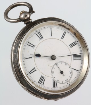 A silver cased key wind pocket watch with seconds at 6 o'clock and a plated ditto 