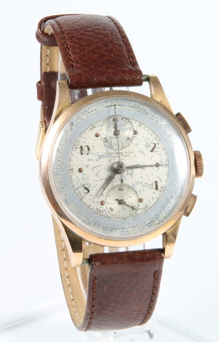 A gentleman's 18ct gold Swiss chronograph wristwatch with 2 subsidiary dials on a leather strap 