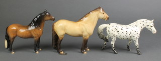 A Beswick figure of a dappled horse 10", a ditto highland champion Mackionneach 9" and a Dartmoor champion Jentyl 8" 