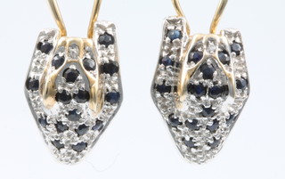 A pair of 9ct gold sapphire and diamond Cartier style panther ear clips 