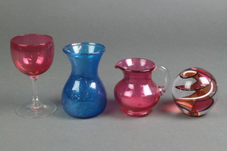 A cranberry glass jug 3", a vase, glass and paperweight