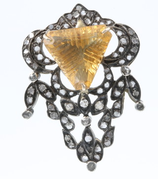 A gold and silver mounted citrine pendant 

