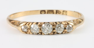 An 18ct yellow gold 5 stone diamond ring, size P