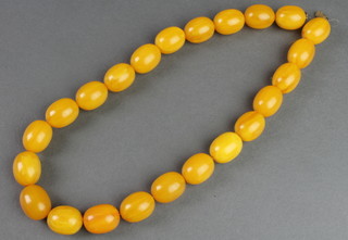 A yellow amberoid bead necklace 18" 