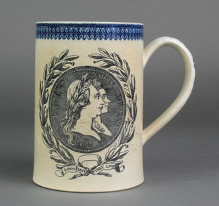 A creamware transfer print George III and Queen Caroline commemorative pint mug - A King Revered a Queen Beloved, 6" 