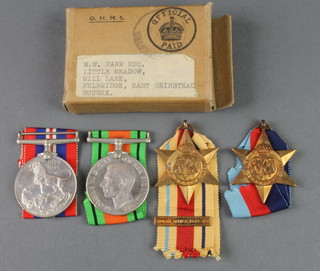 World War Two group 1939-45 and Africa Star, Defence and War medal in posting box to M.W.Parr Esq 