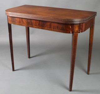 A Georgian D shaped mahogany tea table with inlaid apron, raised on square tapering supports 30"h x 36"w x 18"d