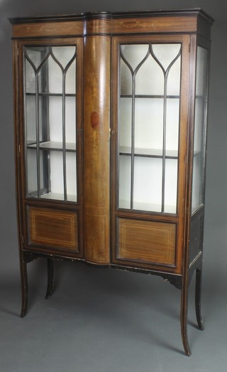 An Edwardian inlaid mahogany display cabinet, the interior fitted shelves enclosed by astragal glazed panelled doors, raised on square tapered supports 67 1/2"h x 41 1/2"w x 13 1/2"d 