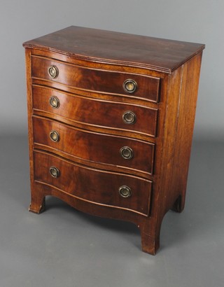 A Georgian style chest of serpentine outline fitted 3 long drawers with brass ring drop handles, raised on splayed bracket feet 30"h x 24"w x 15"d 