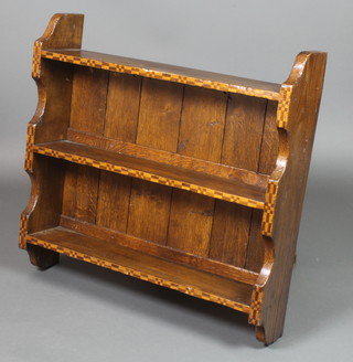 An oak 2 tier hanging shelf with parquetry decoration 30"h x 31"w x 8"d
