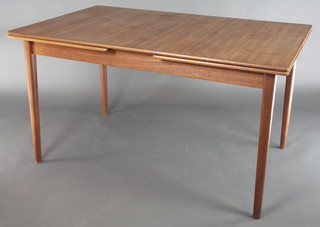 Nils Jonsson, a 1960's Swedish teak draw leaf dining table, raised on turned supports, the base marked Rodes Model Bjarni Bar Bomag 29"h x 53"l x 96" when fully extended by 33"w 
