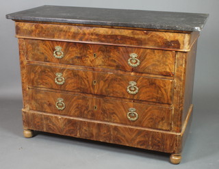 A 19th Century French figured walnut commode with black veined marble top, fitted a secret drawer above 3 long drawers with brass escutcheons and drop handles, raised on bun feet 36 1/2"h x 51 1/2"w x 22"d 