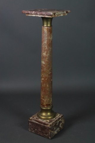 A pink veined marble column with gilt capital, raised on a square stepped base 45"h x 12"w x 12"d 