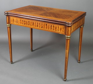A French inlaid Kingwood card table with three-quarter veneered top and satinwood stringing, raised on turned supports 30"h x 36"w x 22"d 