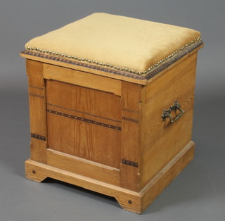 A Victorian Arts & Crafts square oak ottoman with hinged lid and brass drop handles, raised on bracket feet 18"h x 17 1/2"w 