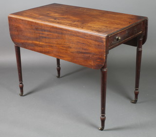 A 19th Century mahogany Pembroke table fitted a frieze drawer and raised on turned supports 28"h x 36"w x 20" when closed by 38" when open 