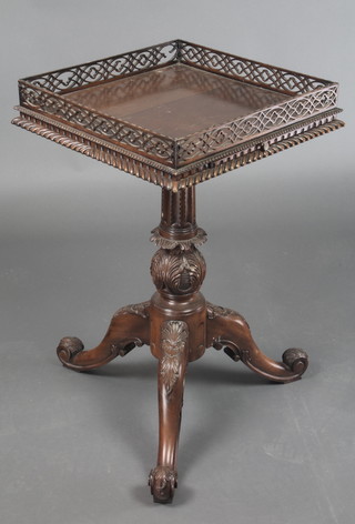 A Chippendale style square mahogany wine table with fret work gallery, raised on turned carved column and tripod base 27"h x 17" x 17" 