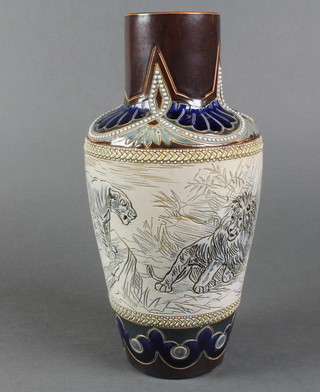Hannah Barlow, a Royal Doulton tapered cylindrical vase, the blue brown ground with a wide incised band of lion and lionesses,  11"h
