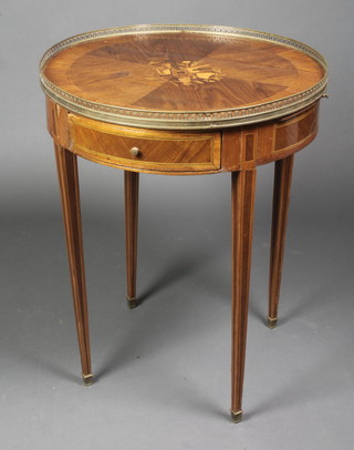 A 19th Century French circular inlaid Kingwood occasional table, the crossbanded top inlaid musical trophies, fitted 2 drawers and 2 brushing slides, raised on square tapering supports, brass caps 29"h x 24" diam. 