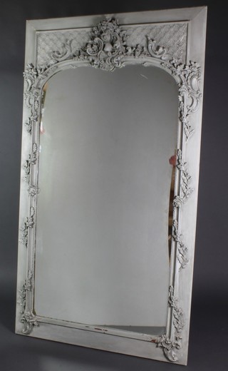 A French style arched plate wall mirror contained in a decorative grey painted frame with shell and acorn decoration 79"h x 45"w 
