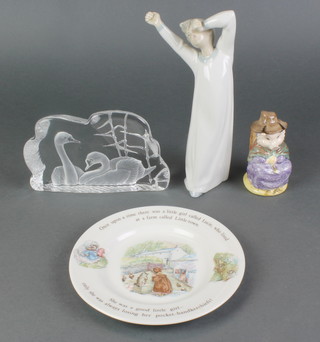 A Lladro figure of a young boy in a nightgown 8", a Beswick Beatrix Potter figure - And this pig had none 3 1/2", a Wedgwood Beatrix Potter plate 5" and a Swedish glass ornament 7" 