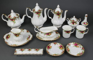 An extensive Royal Albert Old Country Roses tea, coffee and dinner service comprising 28 tea cups, 38 saucers, 4 coffee mugs, 1 large tea pot, 1 small tea pot, 2 coffee pots, 3 cream jugs, 22 tea plates, 2 medium plates, 2 sandwich plates,  4 dinner plates, 5 small dessert bowls, 6 medium dessert bowls, 1 lidded sugar bowl, 5 sugar bowls, 2 pedestal bowls, a sauce boat and stand, 3 dishes, 6 - 3 tier cake stands, 1 urn vase, 1 pin tray, 1 baluster vase, 6 similar English Rose dessert bowls 