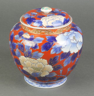 A Japanese baluster Imari vase and lid decorated with peony 5" 