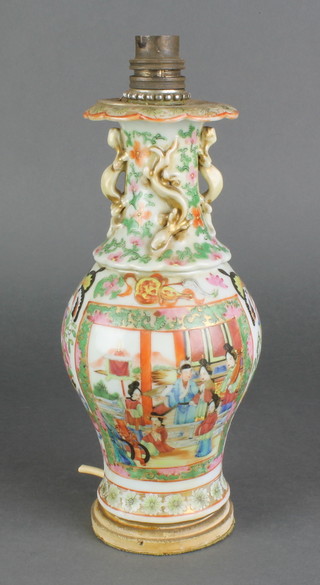 A 19th Century Cantonese oviform vase decorated with figures in pavilions with dragon handles 10" 