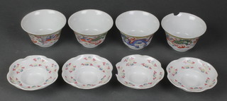 4 Chinese famille rose deep bowls and stands decorated with exotic birds and dragons with 6 character marks to base 